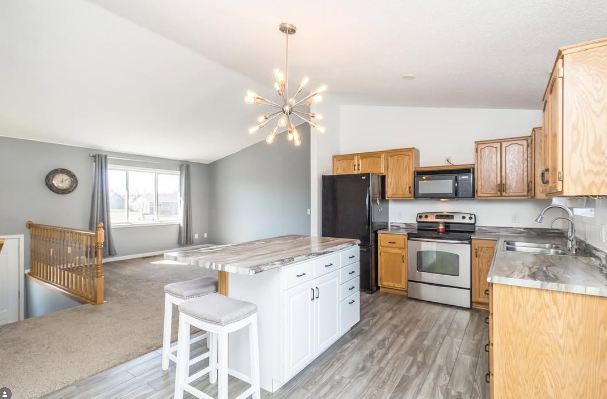 Open kitchen with sputnik chandelier